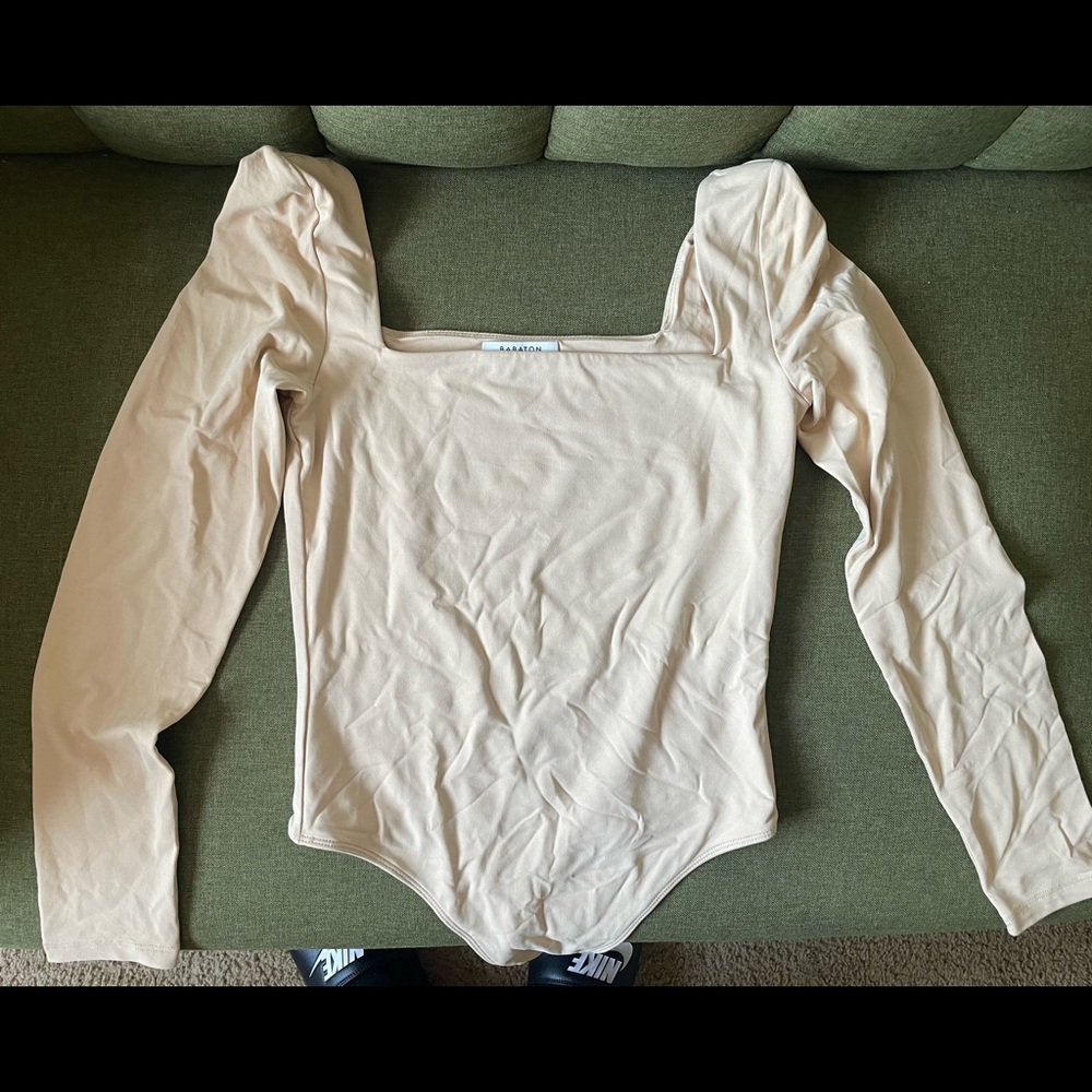 Tan thong bodysuit